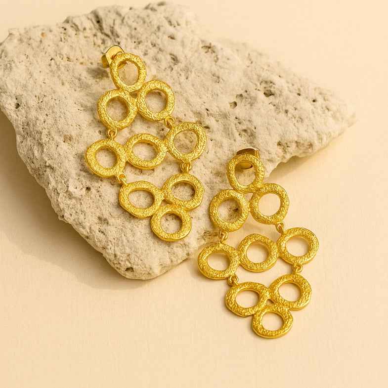 Boucles d'oreilles ajourées • Blanche