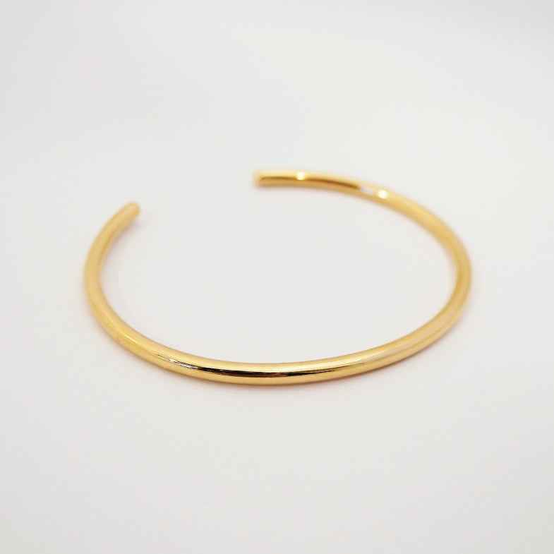 Jonc ouvert doré à l'or 18 carats • Vanessa