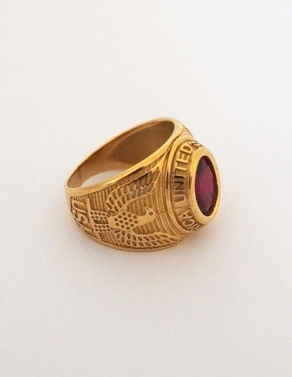 Bague americaine or pierre rouge